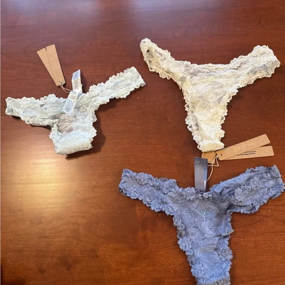 SKIMS Lace Thong Set in Cream, Light Blue, and Blue - Picture 3 of 3